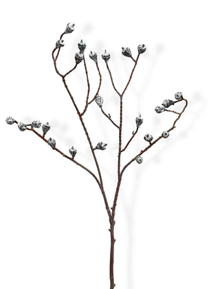 Artificial plant branch with small eucalyptus pods on a white background