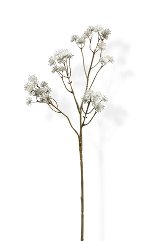 Artificial plant stem with white flowers on a white background