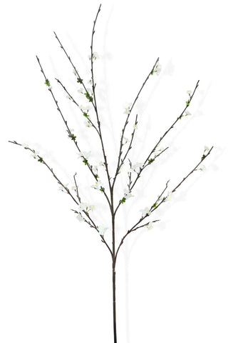 Artificial blossom branch with white flowers on a white background