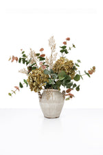 Artificial Autumn Brambles Arrangement in a white ceramic vase on white background