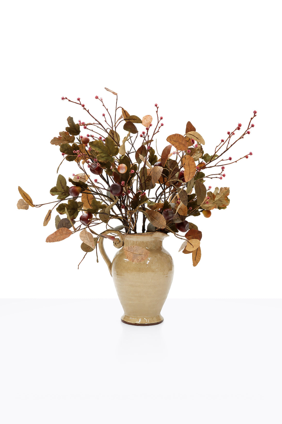 Artificial Autumn Fig Arrangement in a yellow ceramic urn on white background