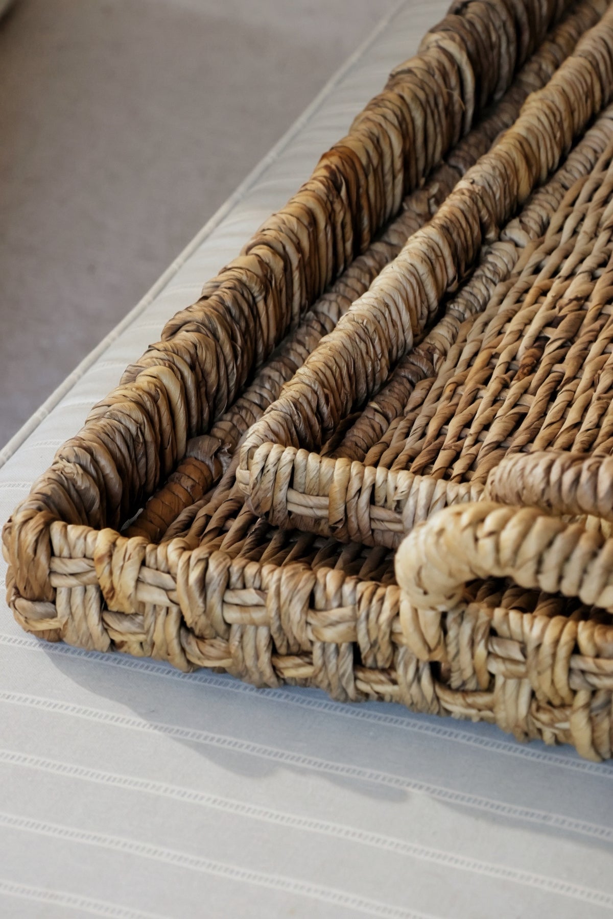 close up details of woven banana bark trays 