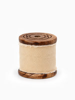 Spool of Frayed Edge Velvet Ribbon, in Champagne, on white for Christmas
