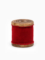 Spool of Frayed Edge Velvet Ribbon, in Crimson Red, on white for Christmas