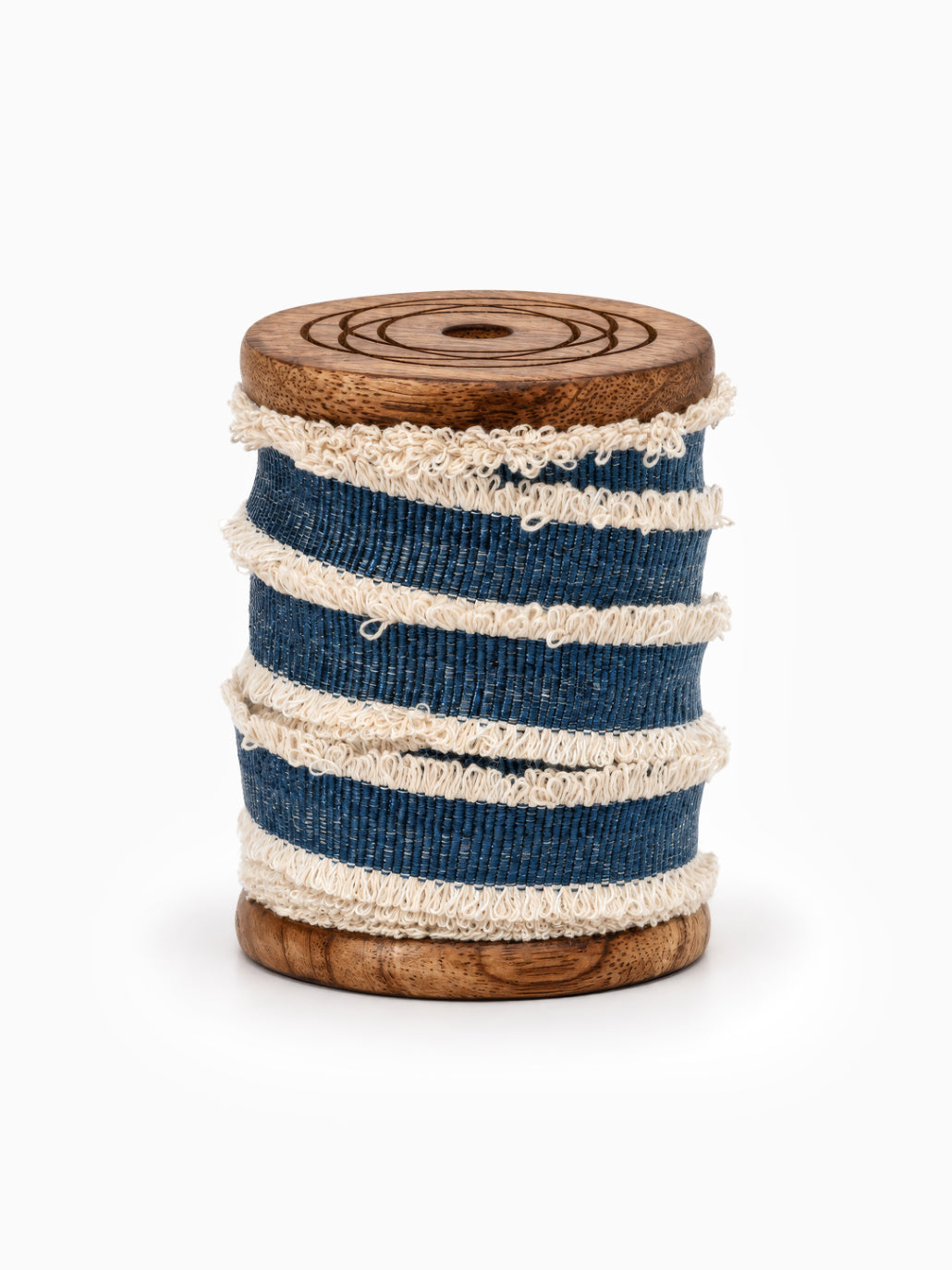Spool of Fringed Blue Ribbon on white for Christmas