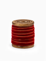 Spool of Gold Edge Velvet Ribbon in Red on white for Christmas