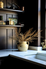 yellow rustic vase with dried look faux autumn stems 