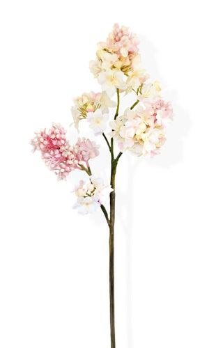 pale pink and white artificial lilac stem on white background
