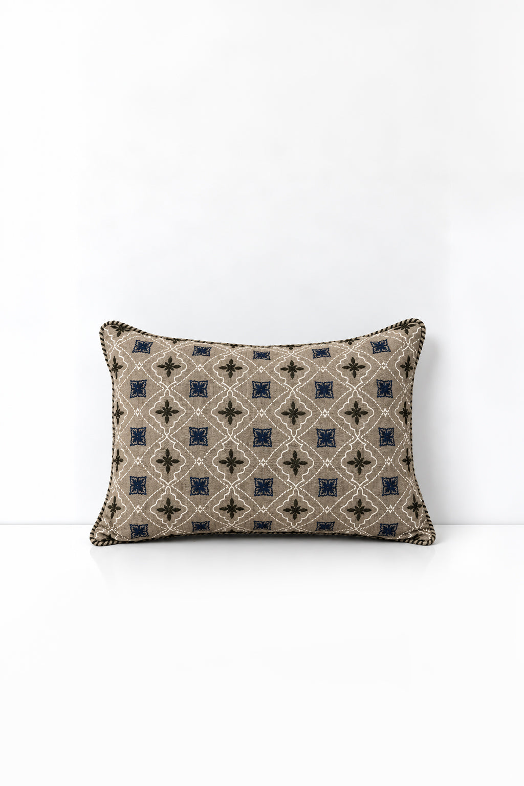 Decorative pillow with geometric pattern on a white background