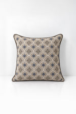 Decorative pillow with geometric pattern on a white background