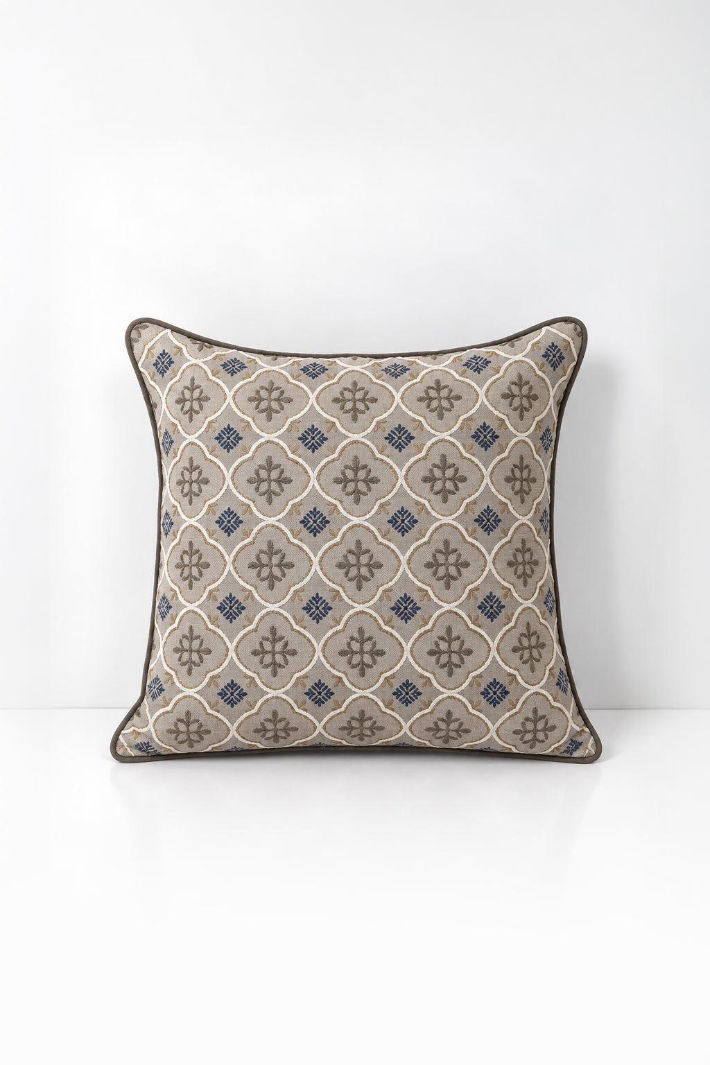 Decorative pillow with geometric pattern on a white background