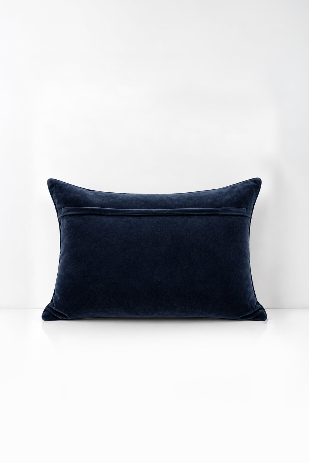 Decorative pillow with quilted velvet on a white background