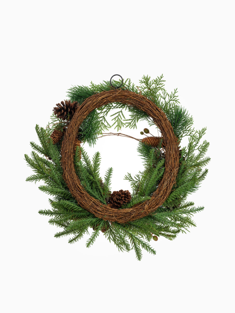 The back of a faux Woodland Wreath on white