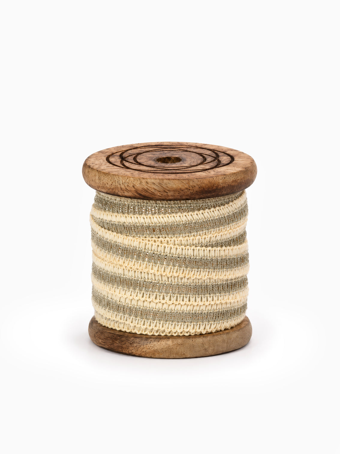 Spool of Woven Edged Champagne Ribbon on white for Christmas