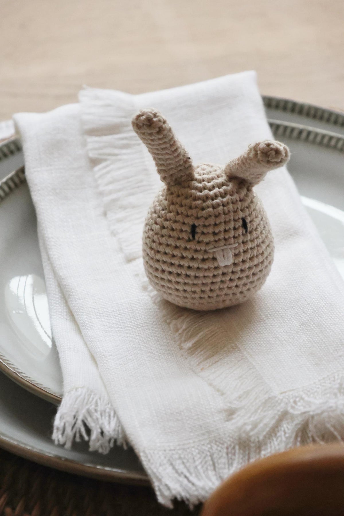 crochet beige bunny on white fray napkin