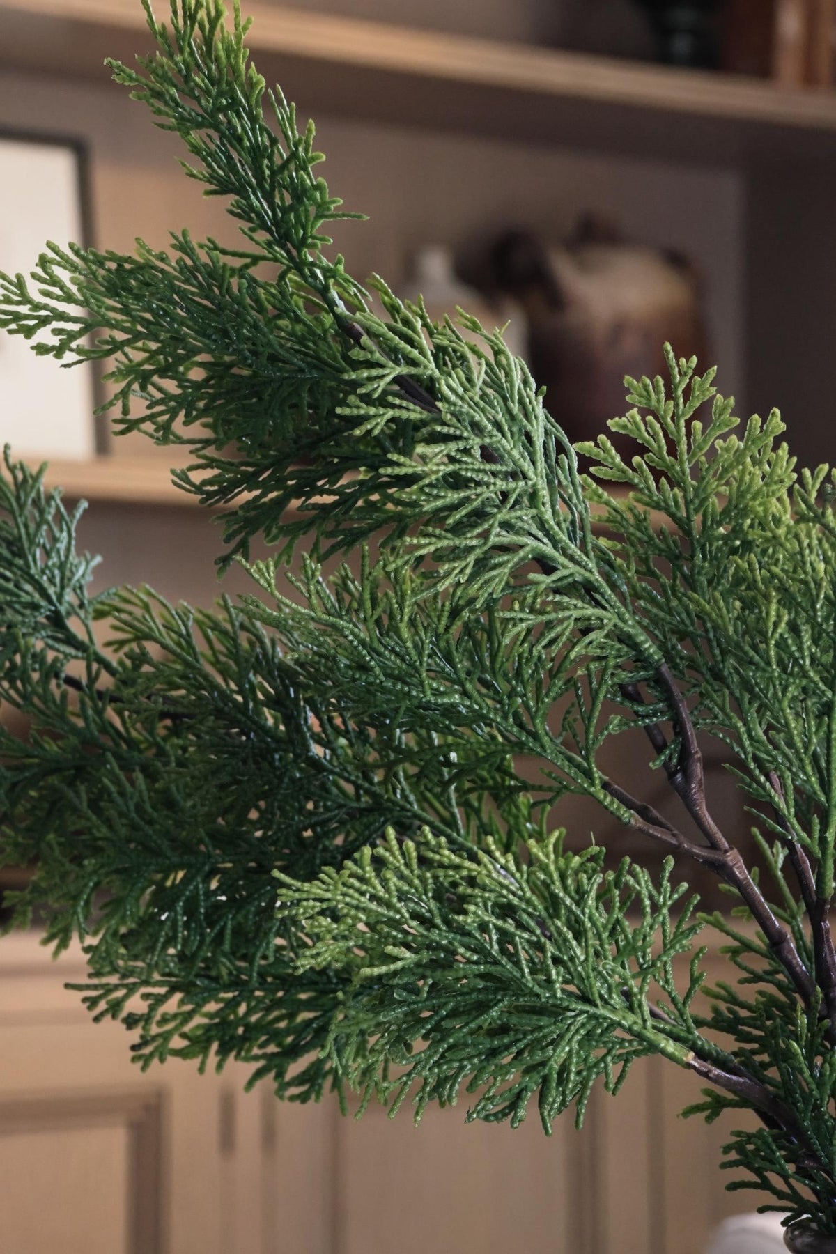 artificial green cypress branch
