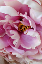 close up of petals of the faux blush pink peony