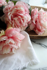 close up of pink petals of artificial peony flowers