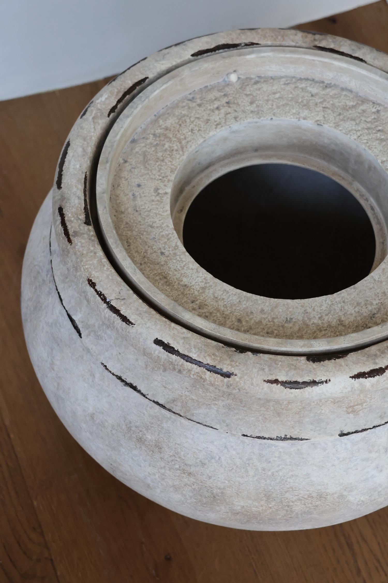 barrow planter with insert from a birds eye view on a wooden floor